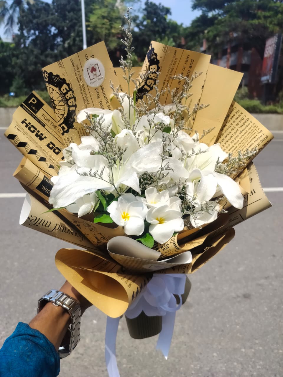 WhatsApp Image 2026-09-28 at 12.25.17 PM Kathgolap (Plumeria) & Lily Mixed Bouquet (Exotic, Ethereal & Luxury) - Image 1
